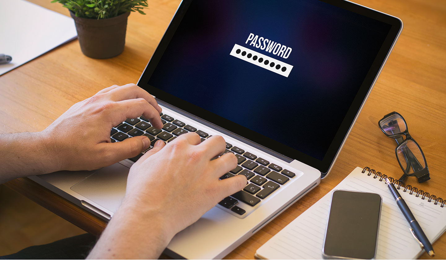 Man selecting a secure password on his computer