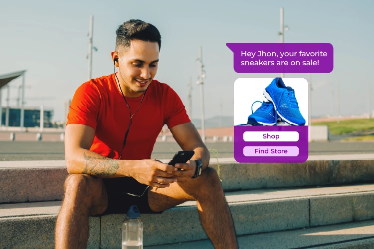 young man receiving a sale notification on phone